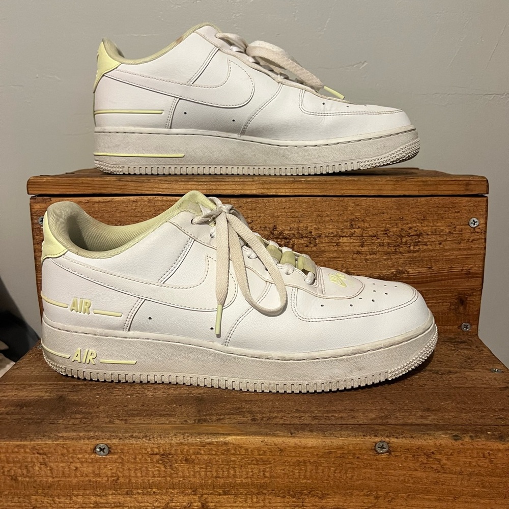 Nike White Ari Force 1 Sneakers with Pale Yellow Accents